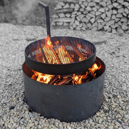 Fire pit with 360 degree swiveling grill